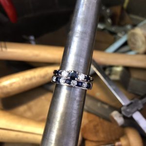 Platinum, diamond and sapphire remodelled engagement and wedding ring