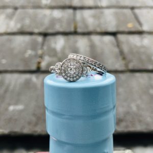 Double halo diamond engagement ring with matching diamond wedding ring