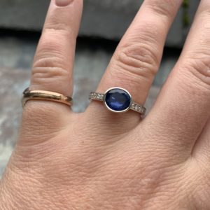Sapphire and diamond rub over set dress ring