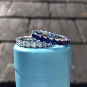 Full claw set diamond and sapphire wedding rings