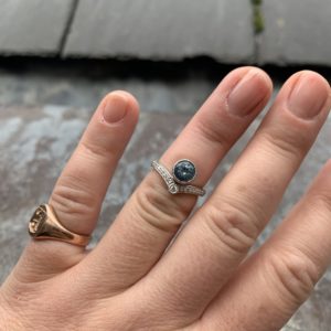 Aquamarine and diamond wishbone ring