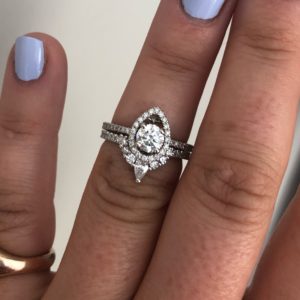 Pear profile halo diamond ring with matching crown design diamond wedding ring