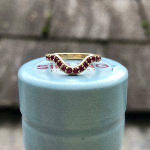 9ct yellow gold and ruby fitted wedding ring - £1050.00