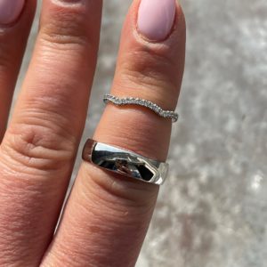 Platinum and diamond micro claw set scallop wedding ring - £1350.00